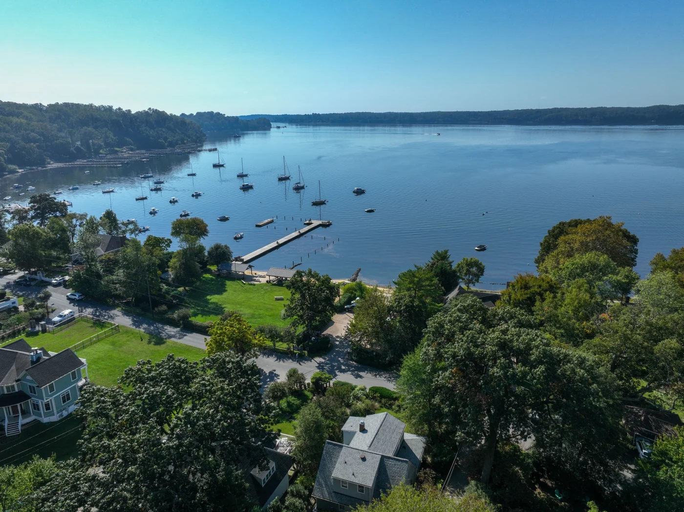 Aerial view of Round Bay’s shoreline, community pier and sailboats on the Severn River